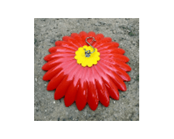 Red flower-shaped ornament with yellow center